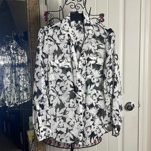 See through blouse with buttons to roll up sleeves. Size M.